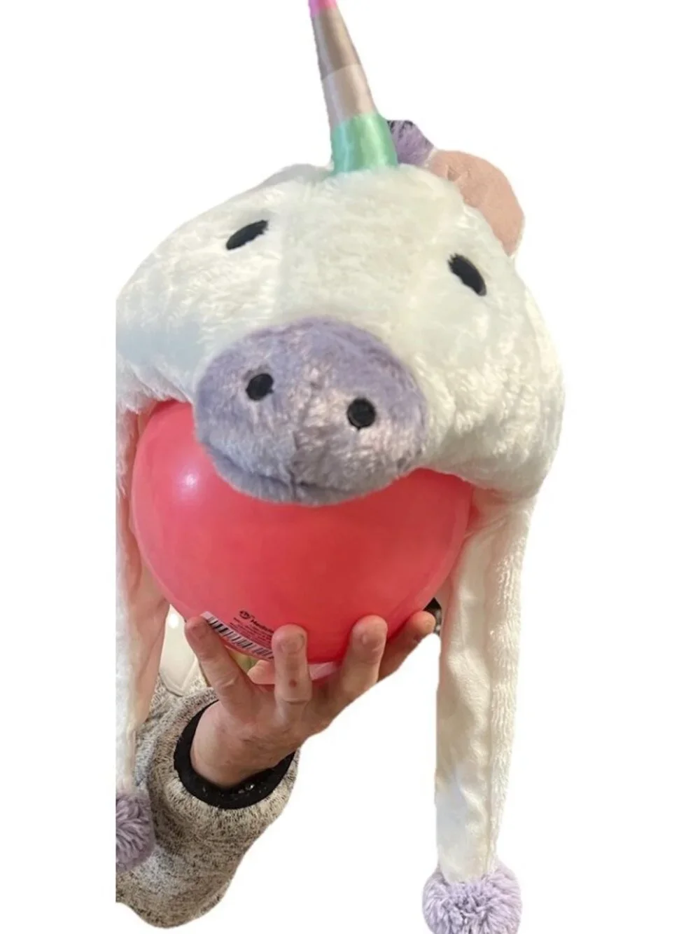 Plush Unicorn Hat with pom-pom ear flaps, whimsical, fun, playful